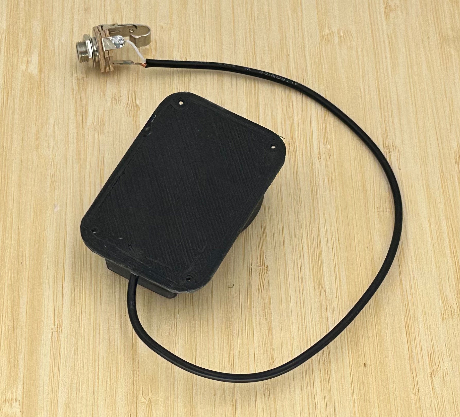 DIY pickup transducer for professional stomp box bass sound